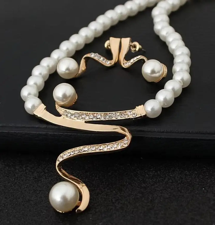 Vintage parel ketting+oorbellen set