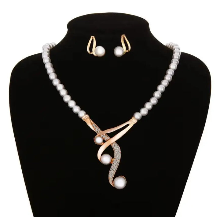 Vintage parel ketting+oorbellen set